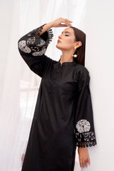 Close-up of elephant and floral motifs on Onyx black kurta sleeves - BEBANO