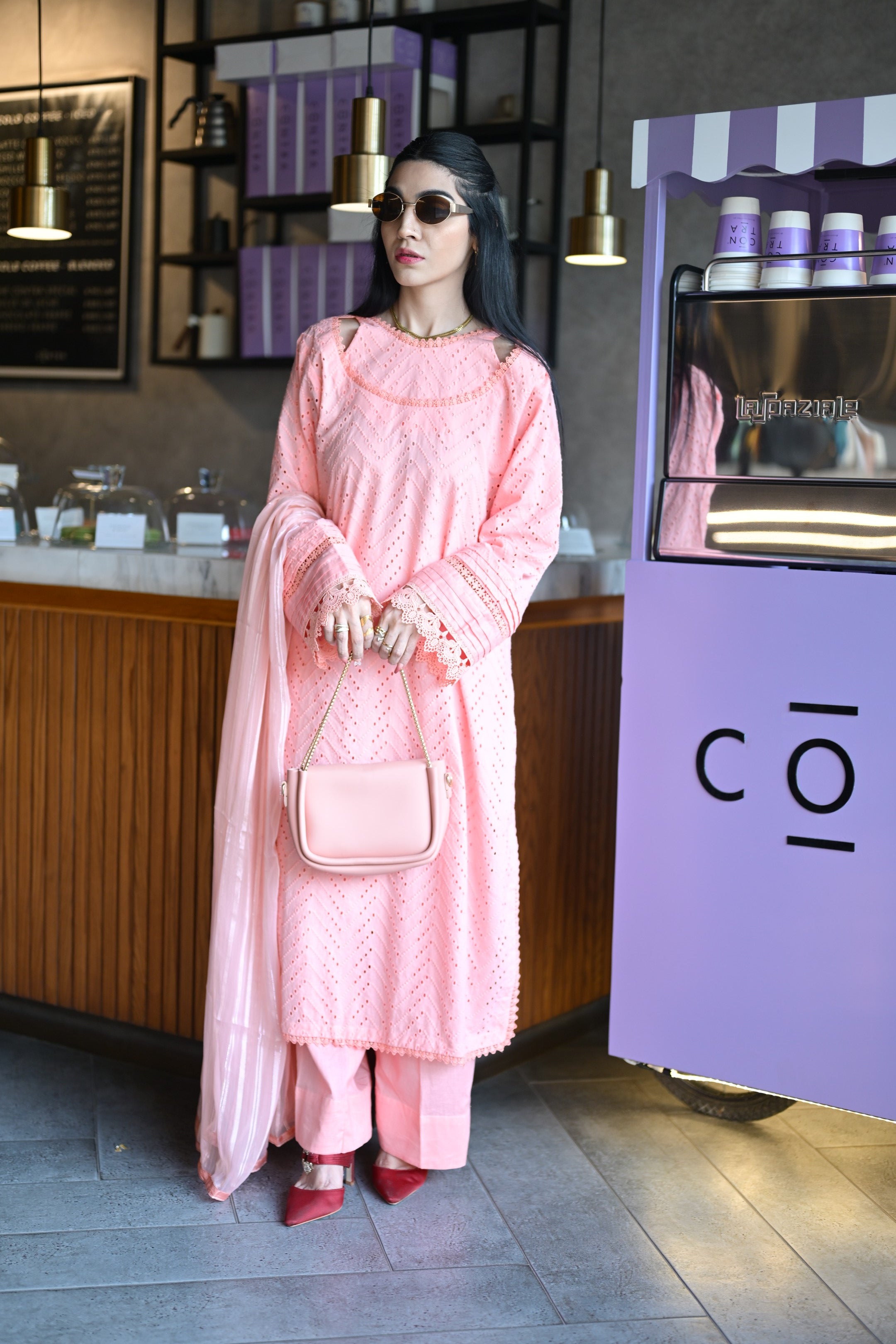 Detailed shot of pleated sleeves and matching lace work on Gulaabi Dastaan.