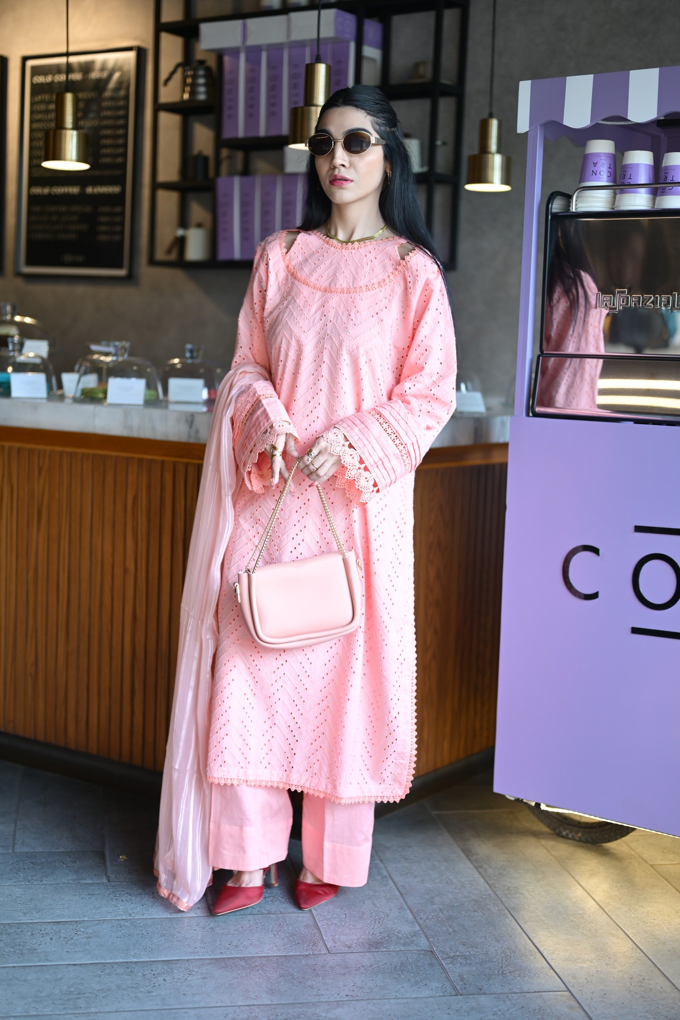 Full body shot of Gulaabi Dastaan styled with matching cotton trouser and satin dupatta.