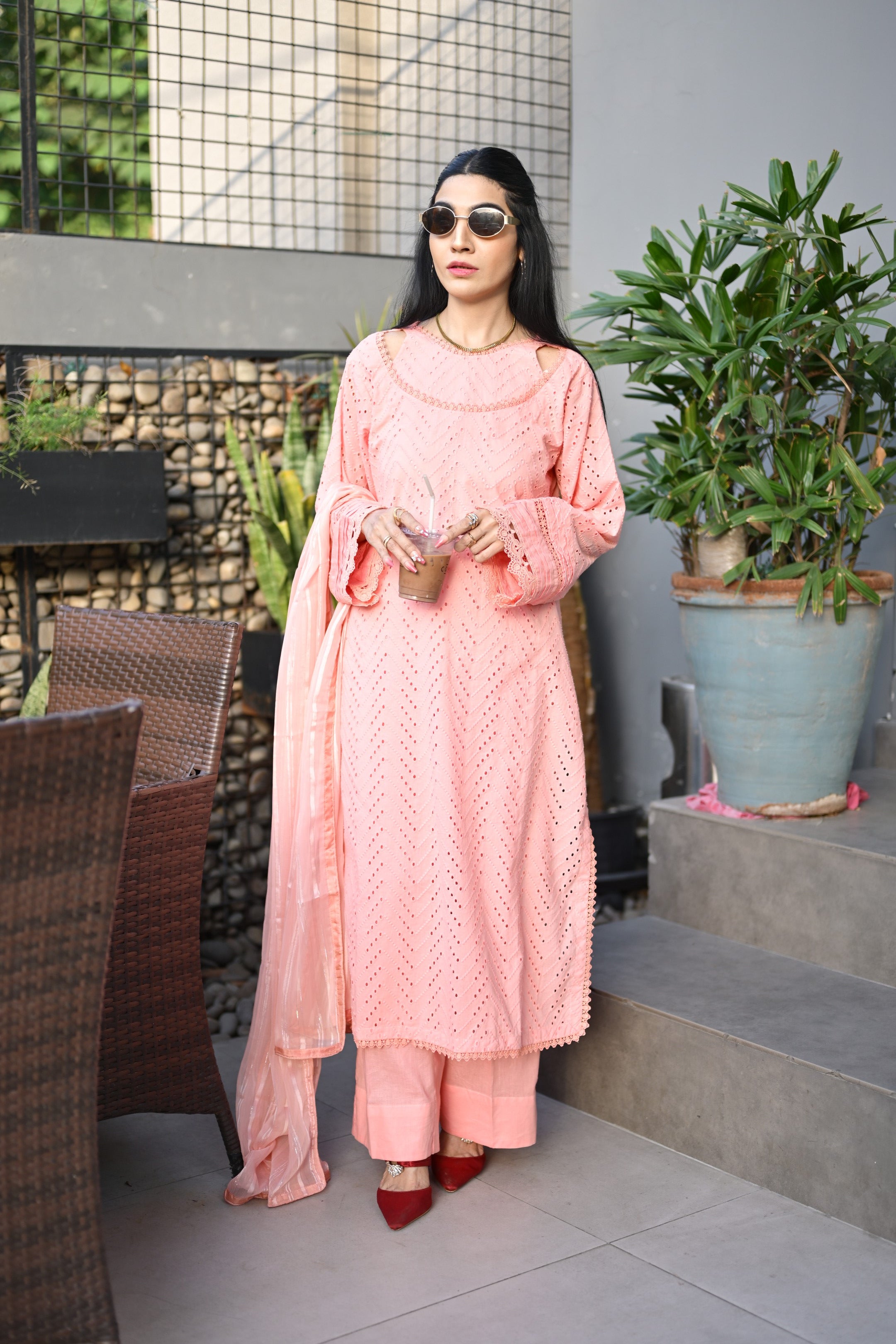 Front full look of Gulaabi Dastaan showing lace-detailed neckline and pleated sleeves.