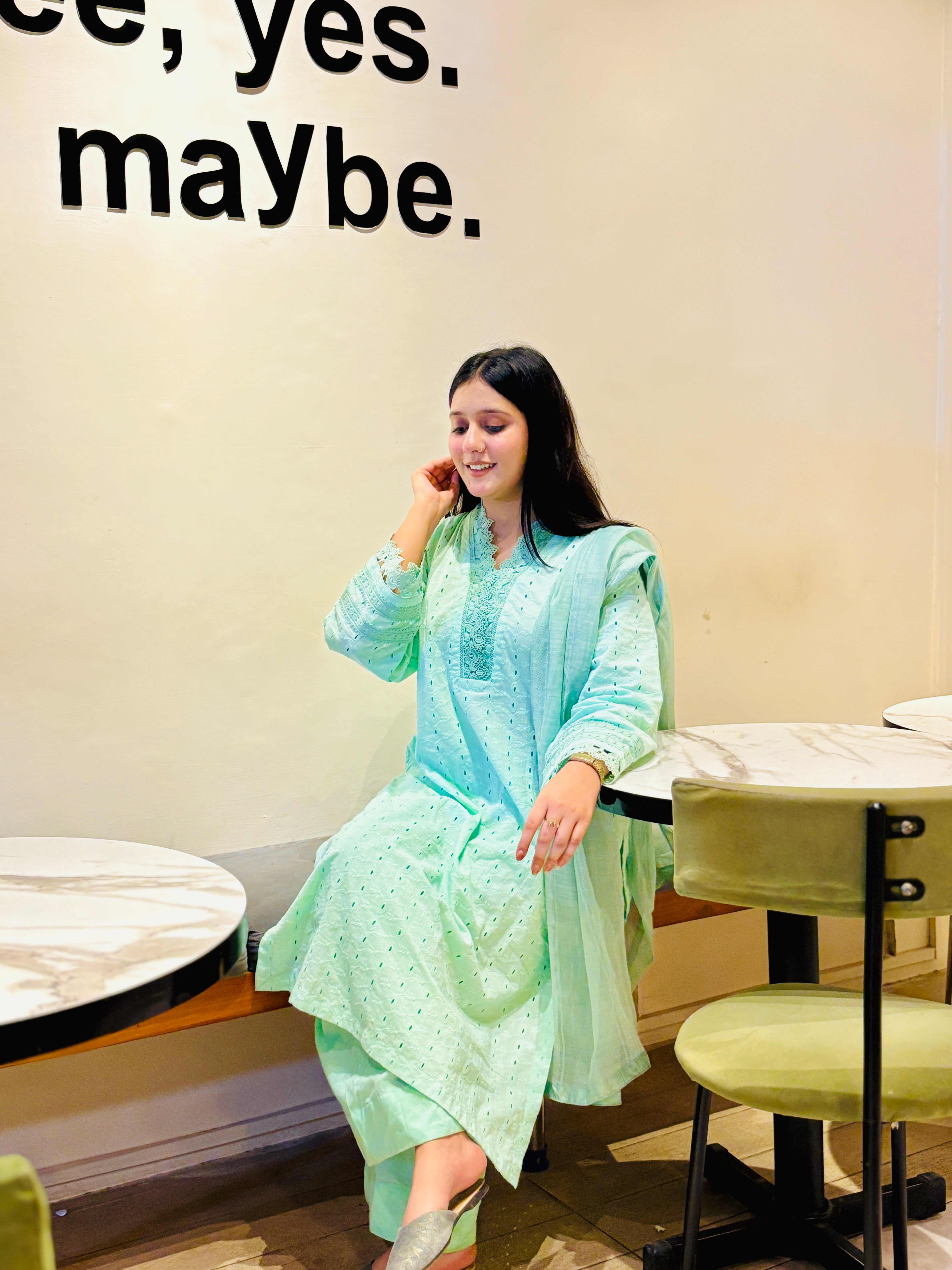 Fabric detail of Nehr-e-Noor Chikan Kari shirt showing intricate weave and lace work.